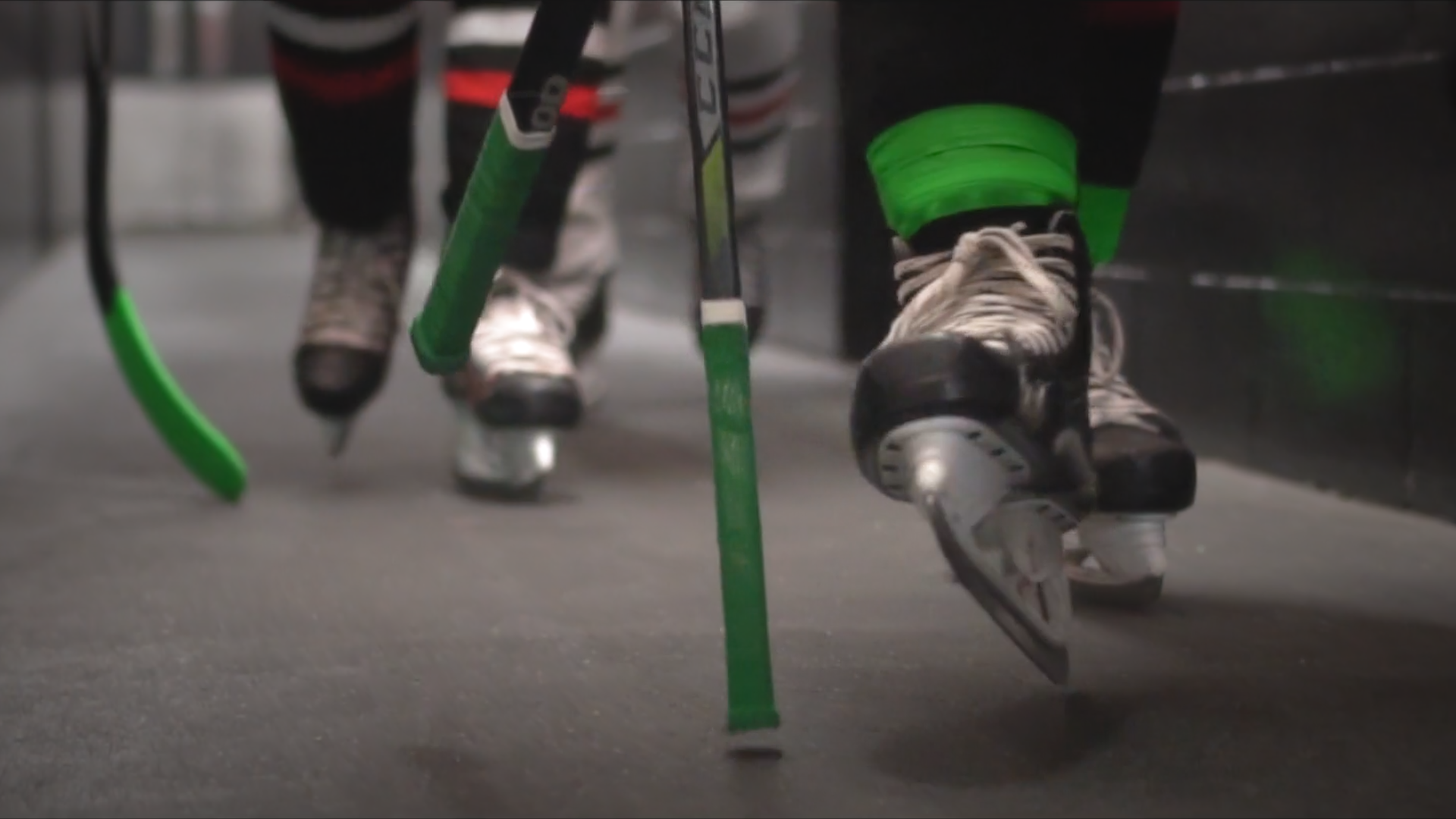 Skates with green tape